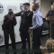 Military son surprises mom at police swearing-in