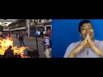 Policeman set on fire as protests turn violent